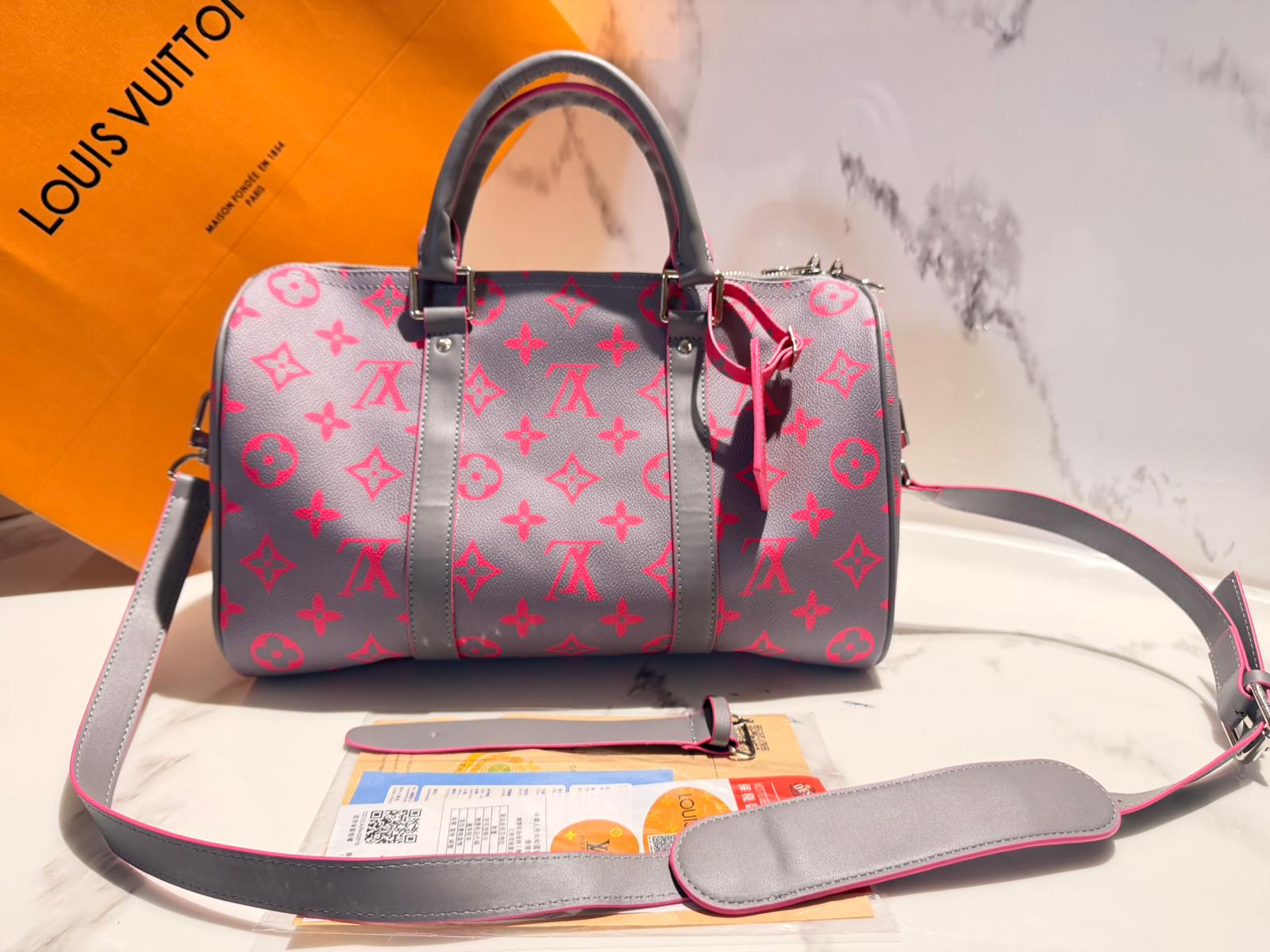 BORSONE LOUIS VUITTON