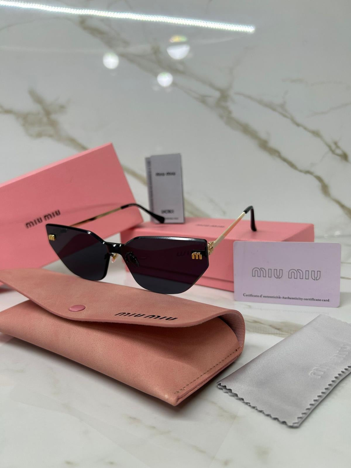 OCCHIALE MIU MIU